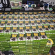 A photo of 2,706 copies of Sneak King for the Xbox 360 stacked up together.